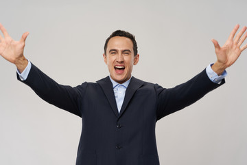 businessman with arms outstretched