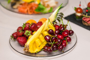 Summer gifts, fruit platter on a dish. Horizontal frame