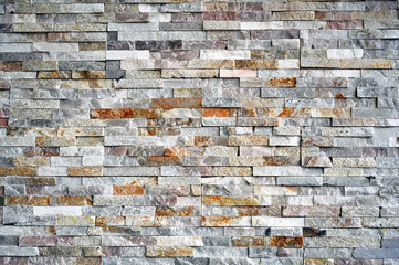 Rough stone wall background of rural buildings