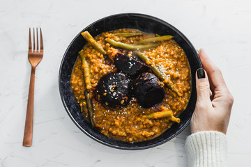 plant-based food, spicy vegetable curry with oven roasted whole beetroots