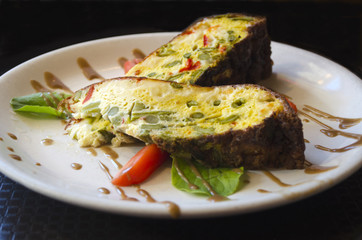 Delicious vegetable fritatta, made with eggs, asparagus and peppers