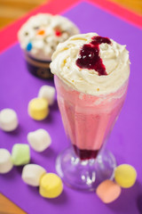 blackberry milkshake decorated with marshmello