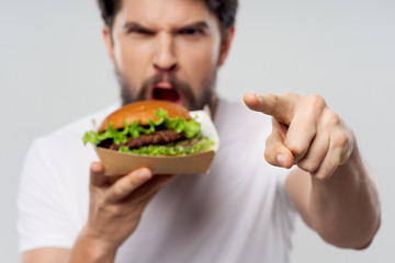 man eating sandwich