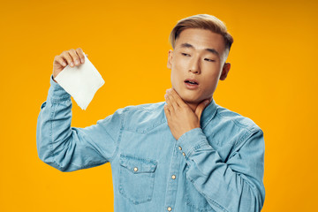young man holding a paper