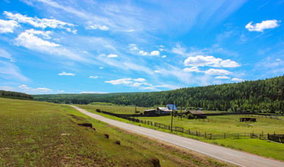 
Federal road passing through a small village in Siberia