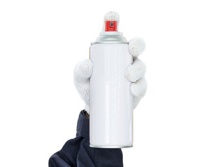 Hand in glove holding spray paint can isolated on white