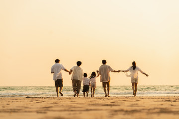 Lifestyle. Asian families on the beach. Travel, Vacations, Post Crisis Vacations