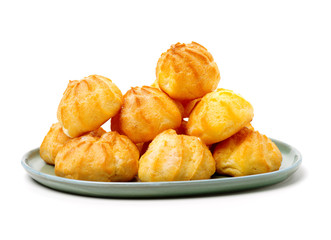 eclairs filled with fresh cream on white background