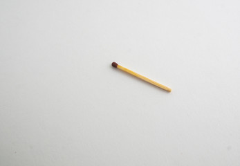 wooden match on a white background