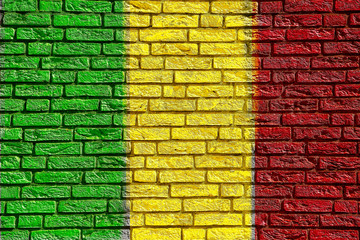 Colorful background and texture depiction of country flag on a brick wall. 