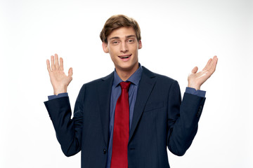 young businessman showing thumbs up