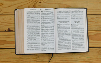 open bilingual bible book on James, Spanish and english 