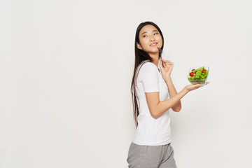 young woman holding a bunch of flowers