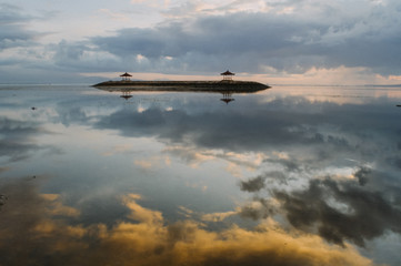 The view at sunrise on the beach in Sanur, Bali