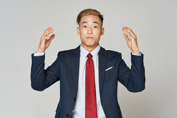 businessman with his arms raised