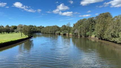 The Cooks River with mangroves and blue sky. Sydney, NSW, Australia