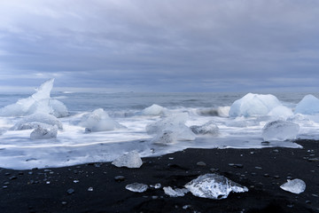 Long exposure of Ice pieces on Diamond beach Iceland