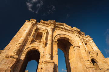 Obraz na płótnie Canvas Gate of Hadrian in the ancient Roman in Jordanian city of Jerash, Jordan, Arab