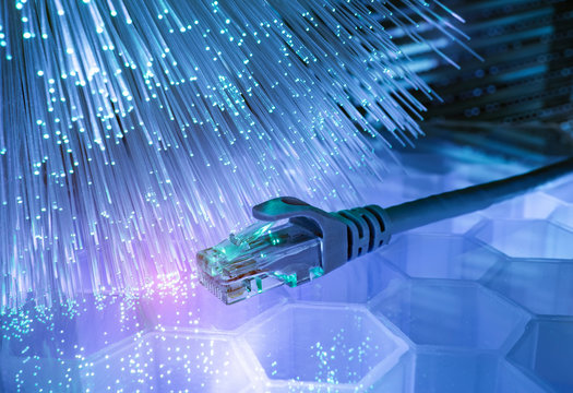 network cables with fiber optical technology background,Communication Concept