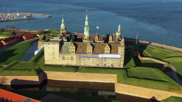 Drone 4K footage of ancient Kronborg Castle in Elsinore in the top of Zeeland Island north of Copenhagen home of Shakespeare's Hamlet (To Be Or Not To Be That is The Question) Denmark Flag Dannebrog