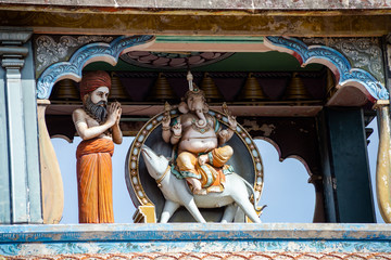 Hindu temple in Tamil Nadu, South India.  Sculptures on Hindu temple gopura (tower), sculpture of...