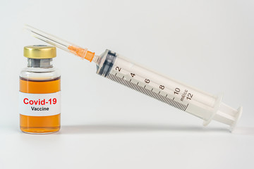 Covid-19 Coronavirus vaccine bottle and syringe injection