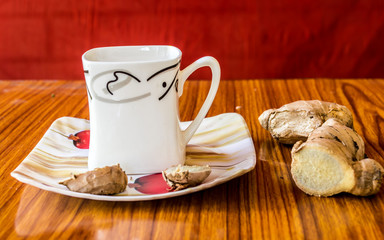 Ginger Tea Adrak Chai Spiced Indian Tea. Adrak wali Chai. Ginger Tea Made with Milk lemon juice, honey, water. Health care and medical nutrition supplement. Ayurveda Home remedy. Healthy lifestyles.