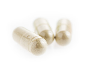 Andrographis capsule isolated on white background