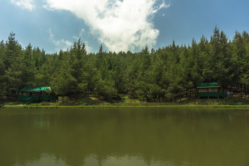 Fototapeta na wymiar Small lakes in he counry side with resort and boating