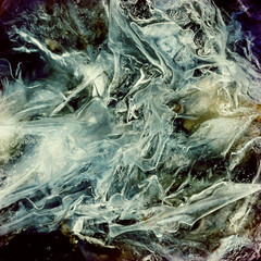Close up abstract view of a plastic bag washed up on the shoreline