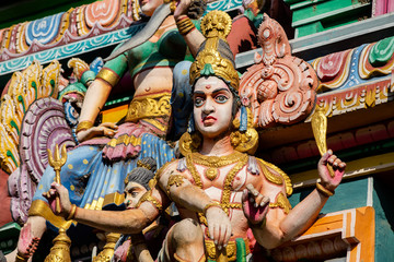 Hindu temple in Tamil Nadu, South India.  Sculptures on Hindu temple gopura (tower)
