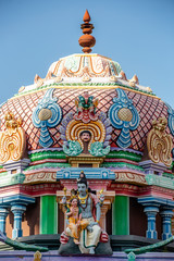 Hindu temple in Tamil Nadu, South India.  Sculptures on Hindu temple gopura (tower)
