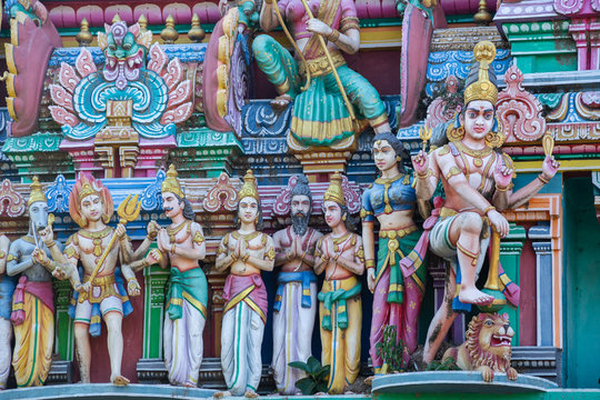 Hindu temple in Tamil Nadu, South India.  Sculptures on Hindu temple gopura (tower)
