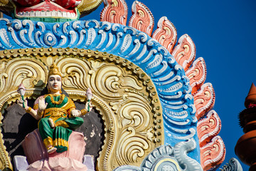 Hindu temple in Tamil Nadu, South India.  Sculptures on Hindu temple gopura (tower)
