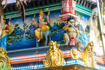 Fototapeta premium Hindu temple in Tamil Nadu, South India. Sculptures on Hindu temple gopura (tower) 