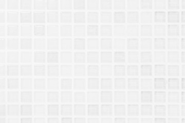 White or gray ceramic wall and floor tiles abstract background. Design geometric mosaic texture decoration of the bedroom. Simple seamless pattern for backdrop hospital wall, canteen and grid paper.