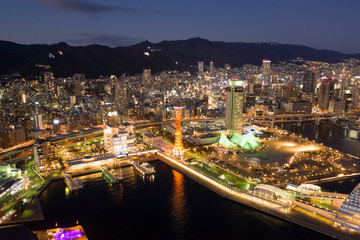 Fototapeta premium Aerial panoramic view of Kobe harbor and Kobe tower in the night