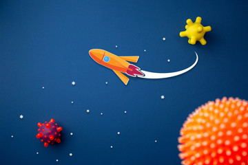 blue background with astronaut, stars and rocket