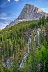 View of Ha Ling Peak and waterfall, Canmore, Canada