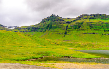Beautiful Iceland highlands with moss-covered volcano formations