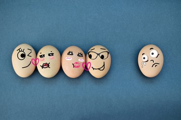 Funny eggs expressions concept with different emotions isolated on flat black background.