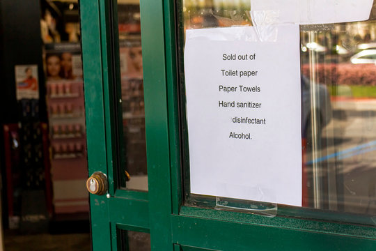 Sign at store stating they are sold out of toilet paper,paprer towels,hand sanitizer,disinfectant and alchohol