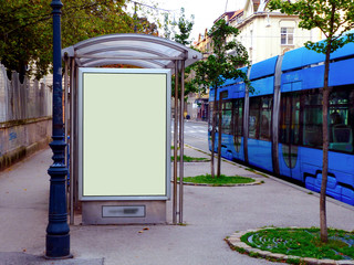 bus shelter at tram stop. bus shelter and busstop. blank billboard ad display. empty white lightbox...