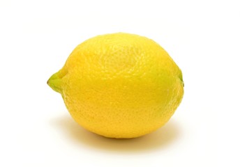 Whole lemon on white background