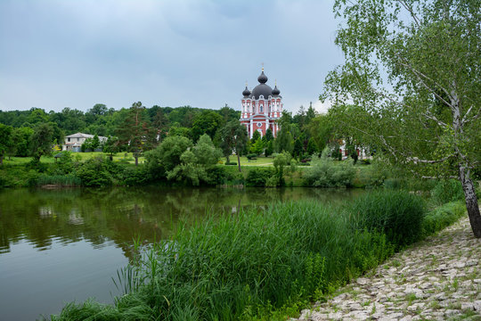 Beautiful view of Curchi Monastery with lake on the foreground, Moldova