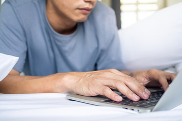 Man typing or social chat using computer. Thousands people have networks that enjoy new technology - concepts of the new generation and social media. stay home and Social distance save from covit-19.