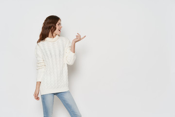 young woman pointing at something