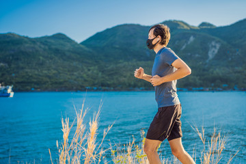 Runner wearing medical mask, Coronavirus pandemic Covid-19. Sport, Active life in quarantine...