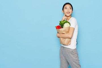 young woman holding a bouquet of tulips