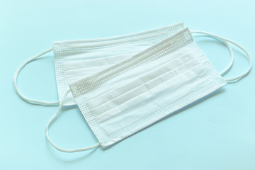 medical hygiene face mask on blue background